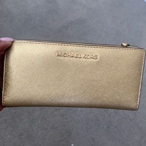Slightly worn MK wallet with mini card holder.